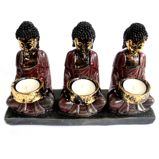 Antique Buddha - candle holder of three devotees