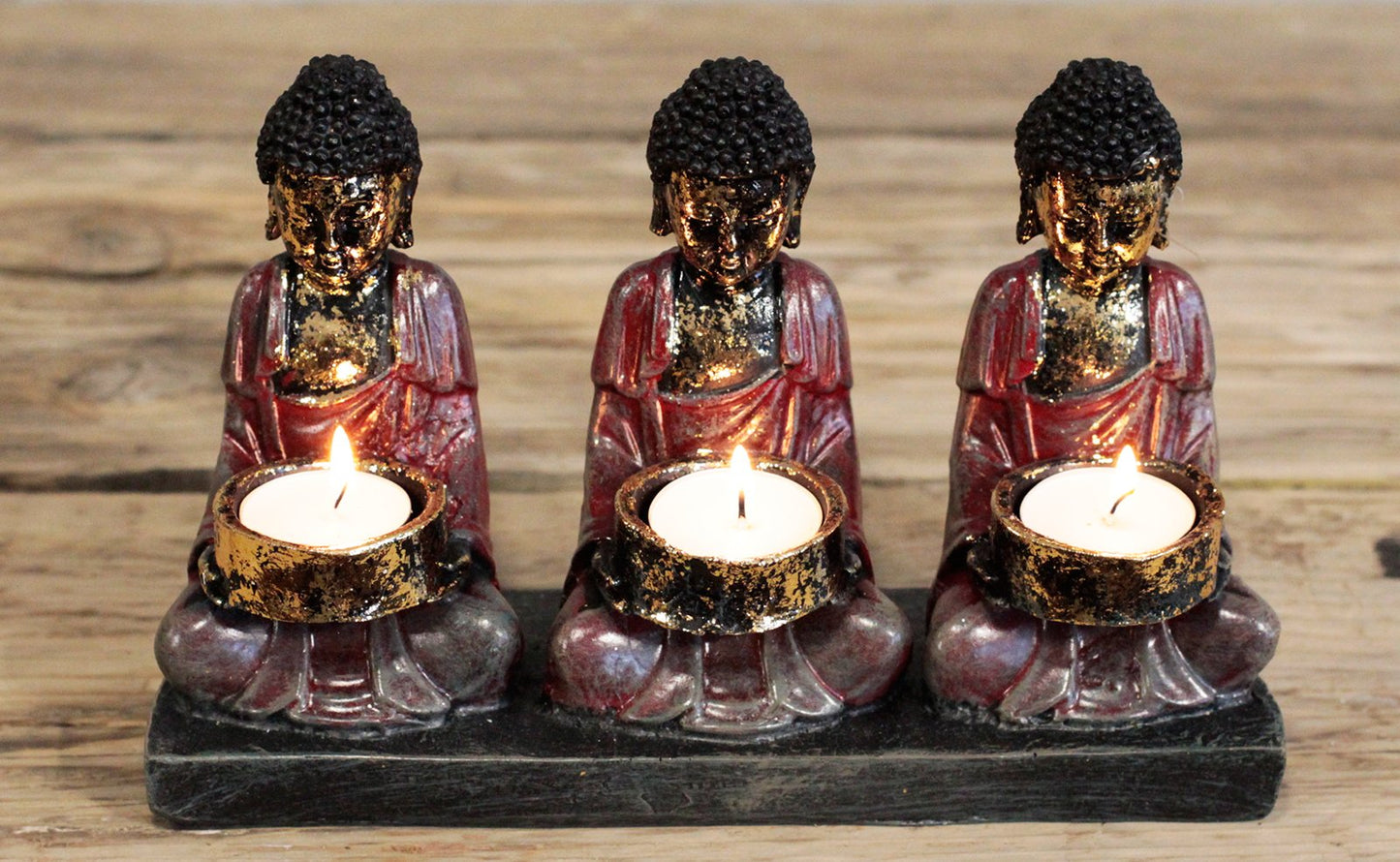 Antique Buddha - candle holder of three devotees