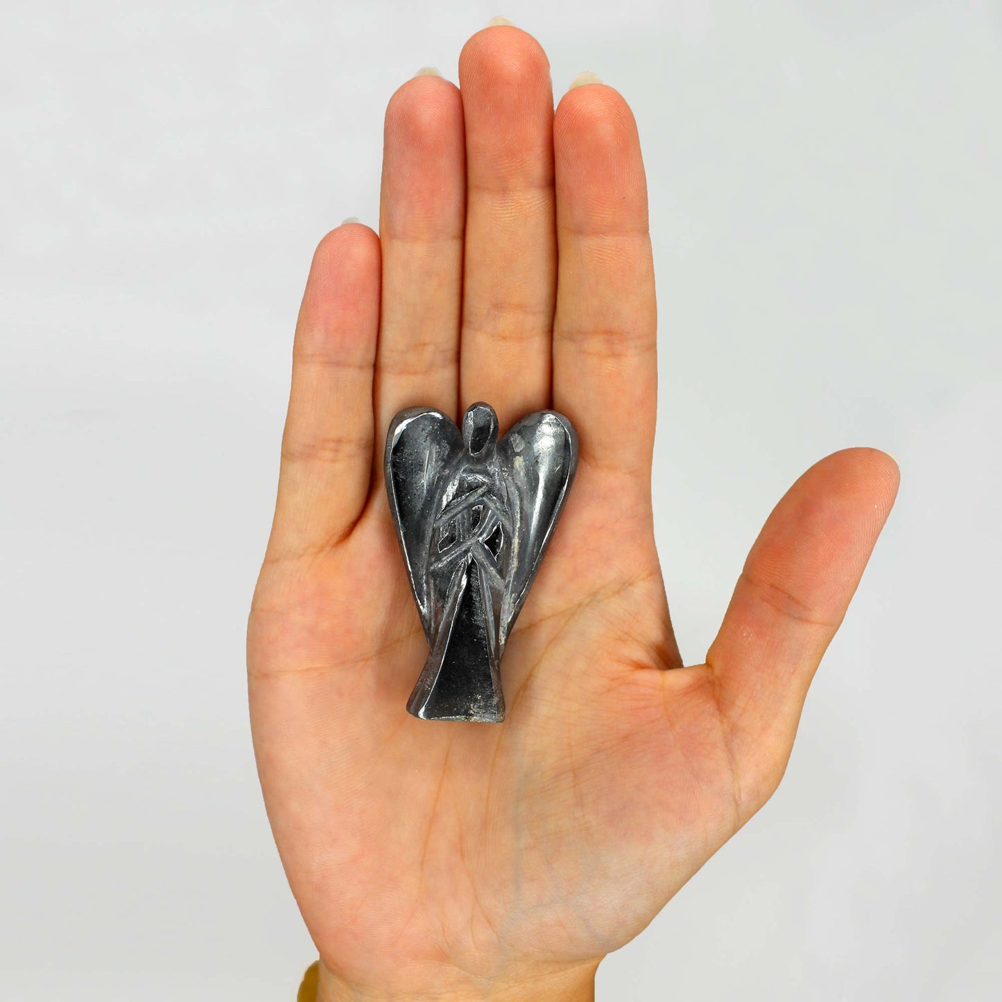 Hand carved precious stone angel - Hematita